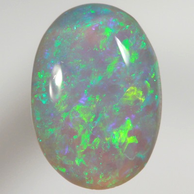 SOLID CRYSTAL OPAL Sparkling green in a 3D pattern, purple hue